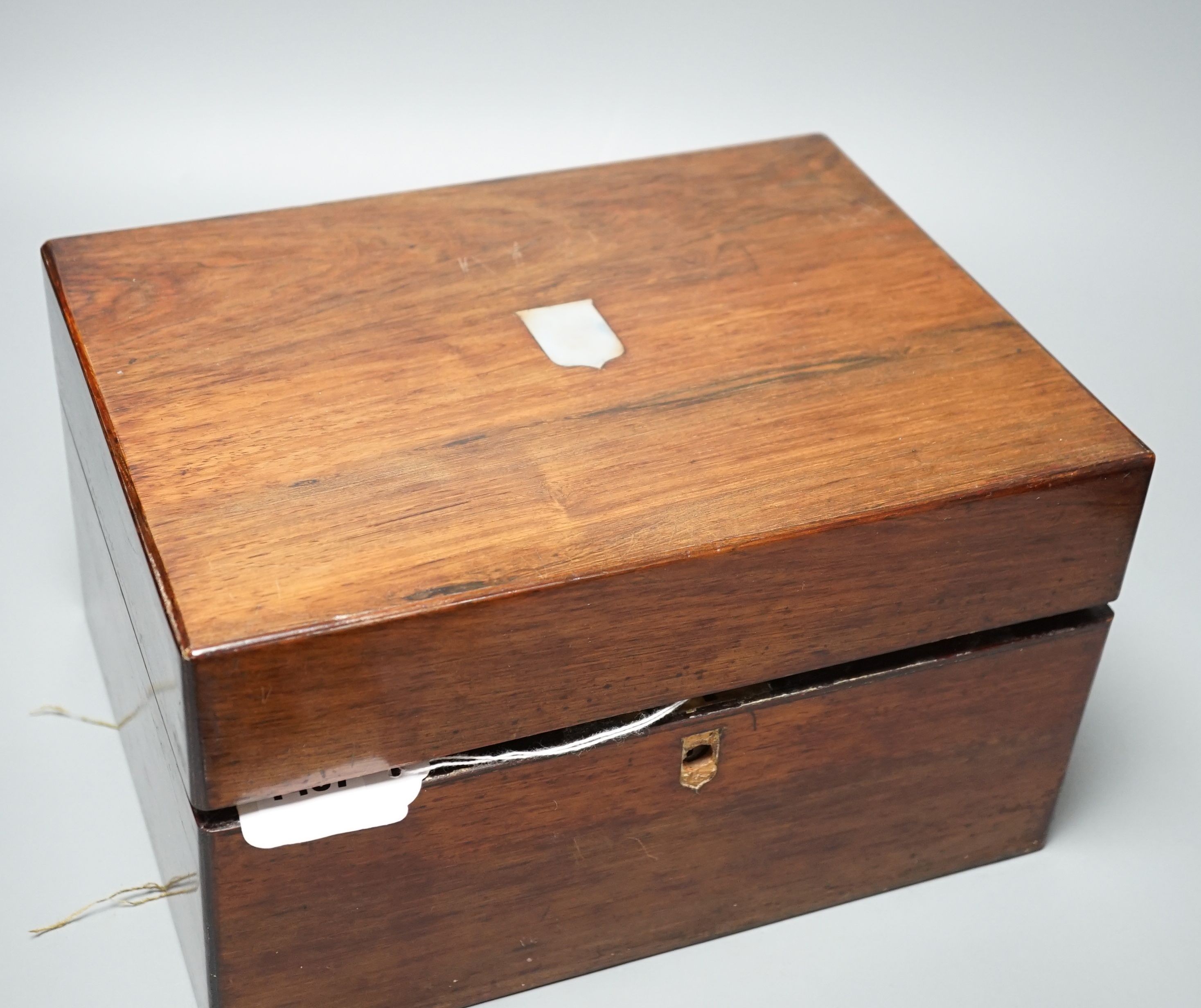 Two Victorian rosewood cased travelling vanity sets with silver plated covers (2)